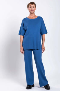 Front view of model wearing blue Bailey Pant and top