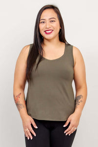 Model wearing olive green Ritzy bamboo tank top, front view