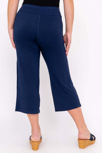 Back view of navy blue yoga capri pants with comfortable waistband