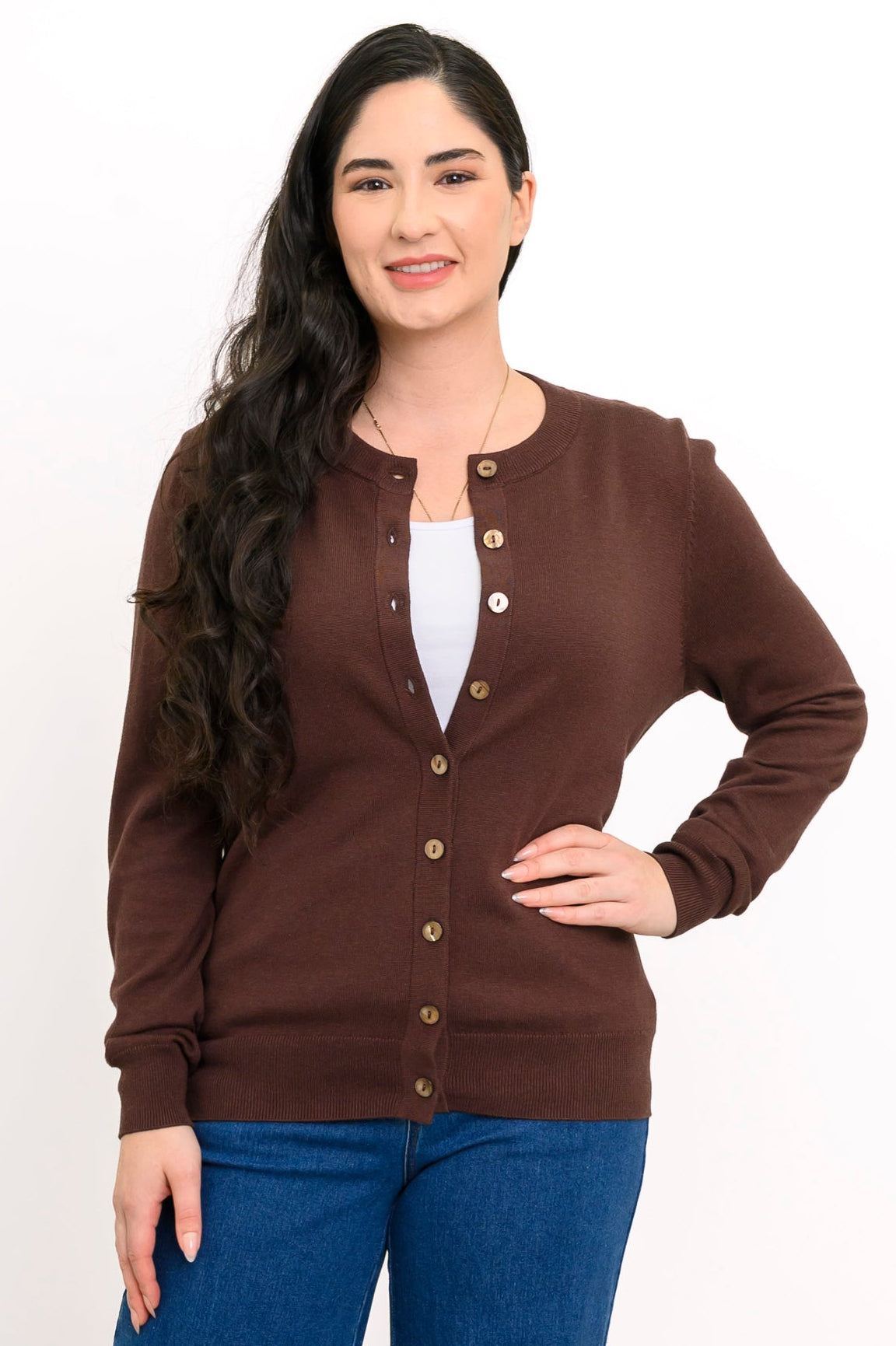 Studio portrait of a woman modeling a dark brown long sleeve button down sweater with a crew neck.