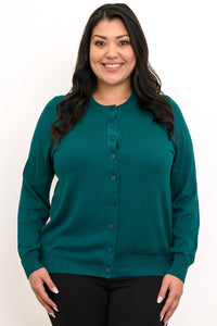 Close up front view of a woman wearing an emerald green crewneck button up cotton knit cardigan.