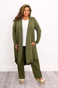 Model wearing olive green duster with long sleeves and open front, paired with matching pants