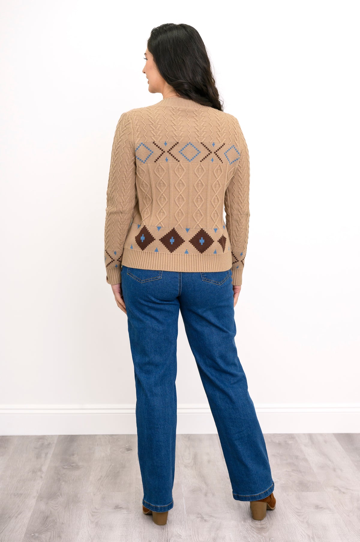 Back view of a beige geometric print sweater, showcasing the continuous pattern across the back and ribbed hem.