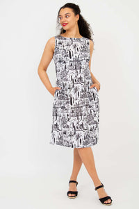 Three-quarter front view of Patricia shift dress with cityscape print