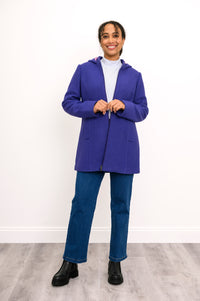 full body view of model in straight fit boiled wool jacket in bright violet