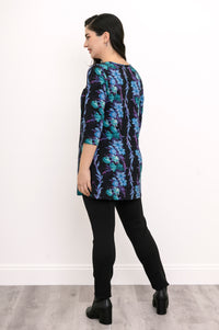 Back view of a blue and teal floral print bamboo tunic, showcasing the relaxed-fit drape and straight hemline.