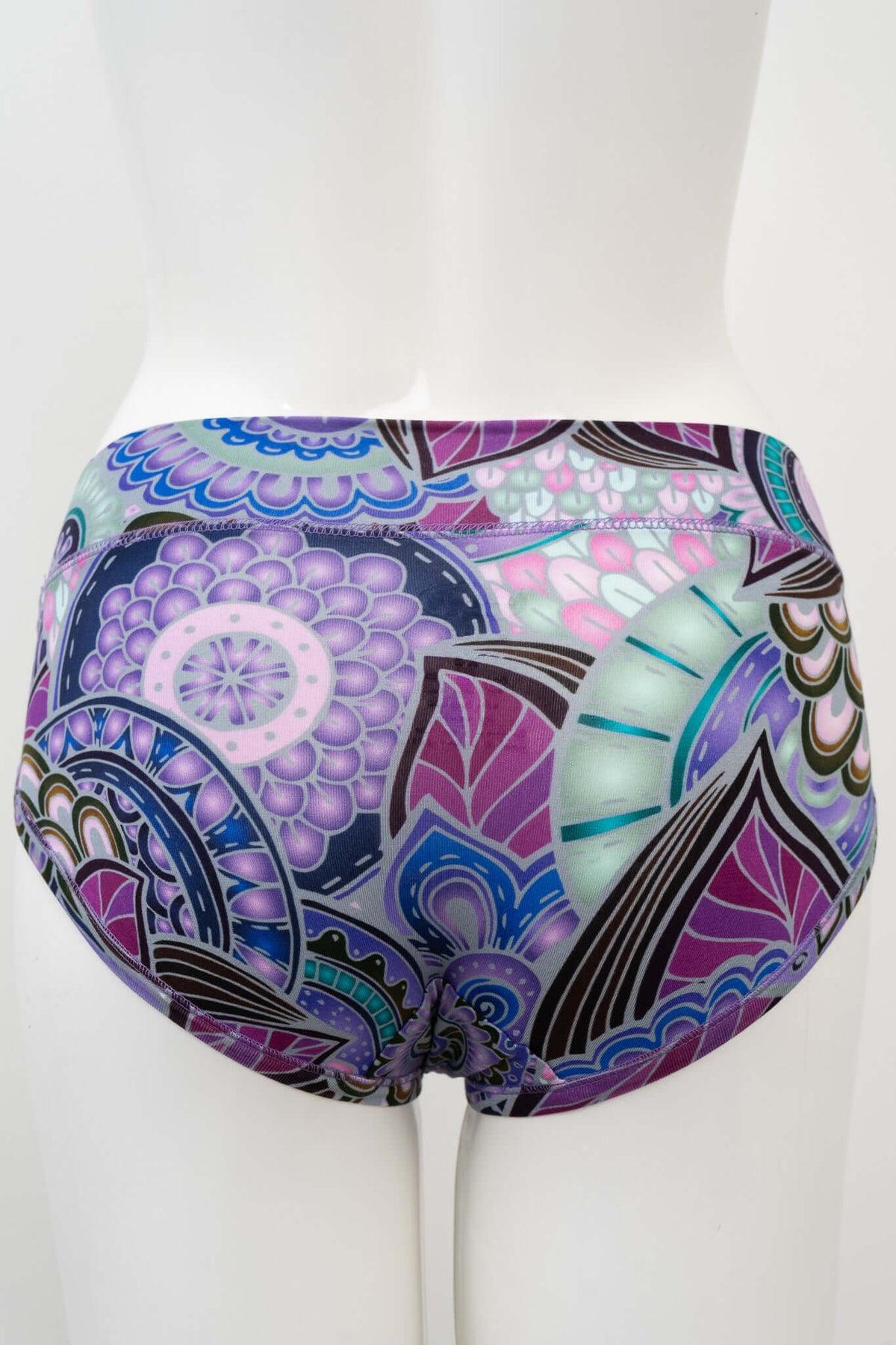 Back view of low rise hipster underwear with colorful abstract petal design