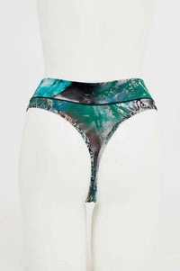 Rear view of bamboo high rise thong with botanical print on mannequin