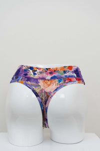 Rear view of floral bamboo high rise thong displayed on a mannequin