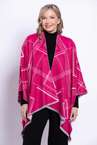 Woman wearing a reversible geometric wrap in fuchsia and pink, front view, closeup