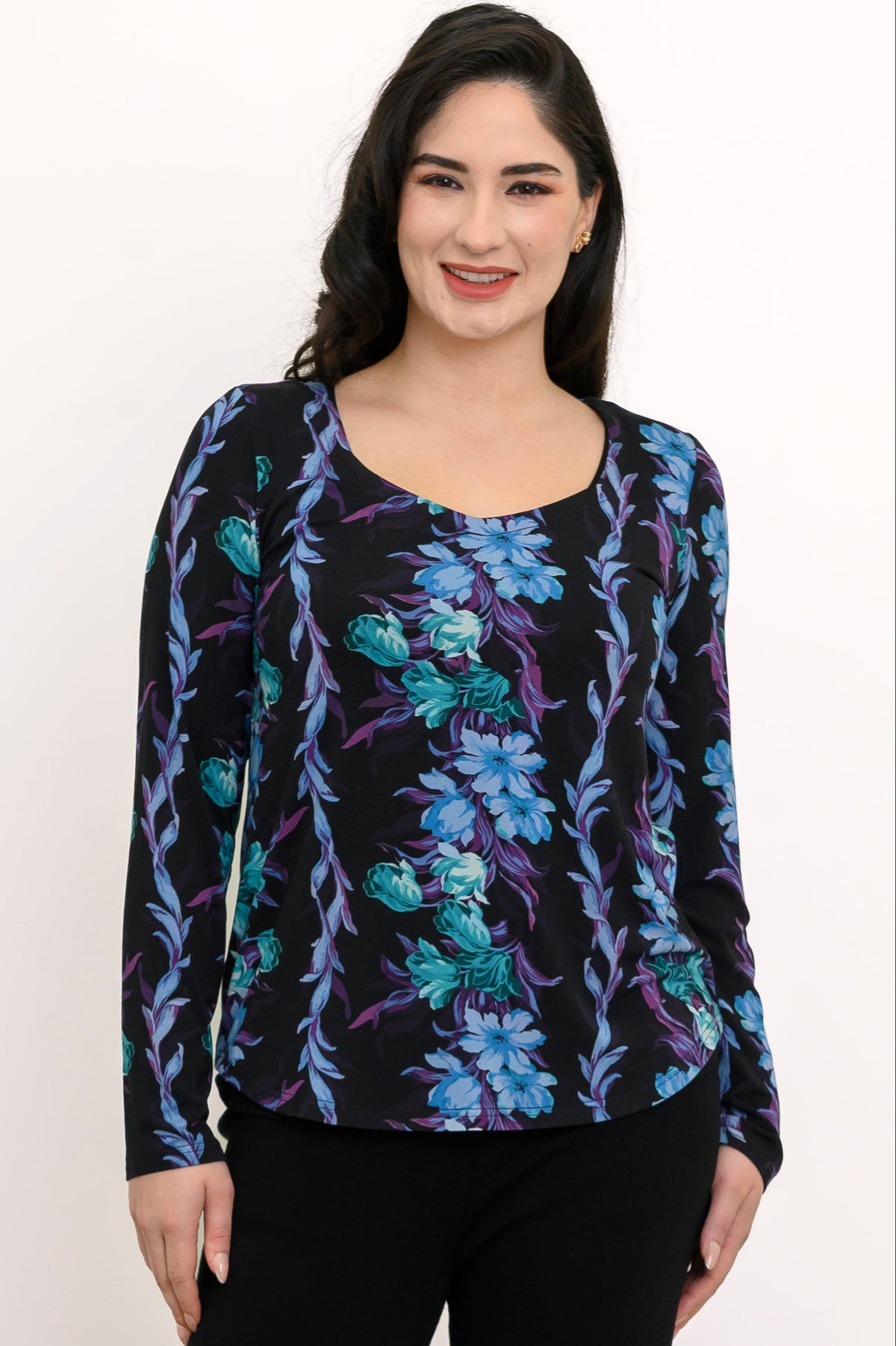 Front view of a teal and black floral print bamboo top with a sweetheart neckline and long sleeves.