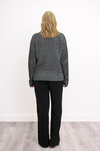 Back view of a charcoal gray cotton sweater, showcasing raglan sleeve seams and a clean binding stitch hemline.