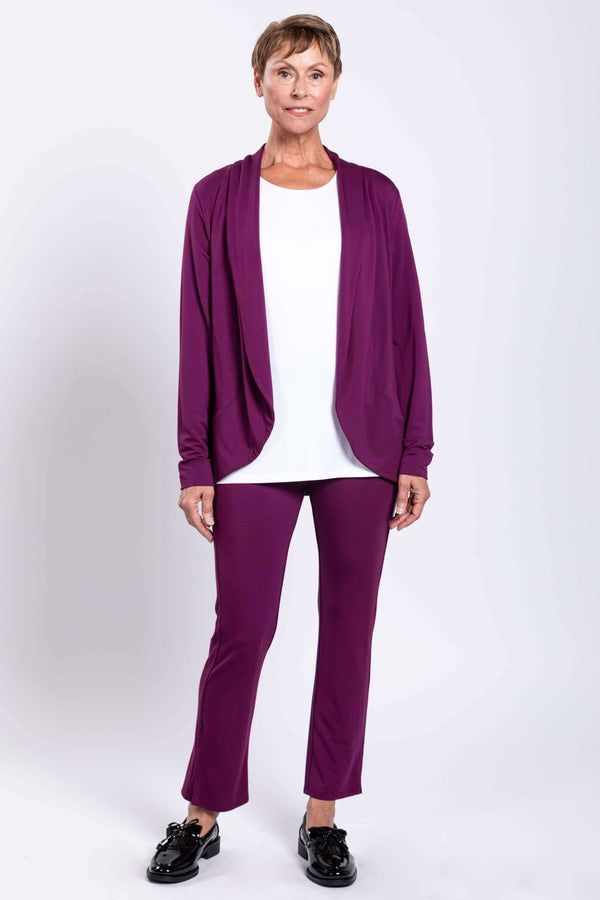 Full front view of Sarina Pant in plum bamboo, styled with white top
