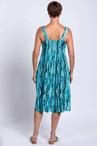 Back view of woman in teal streak sleeveless bamboo linen dress