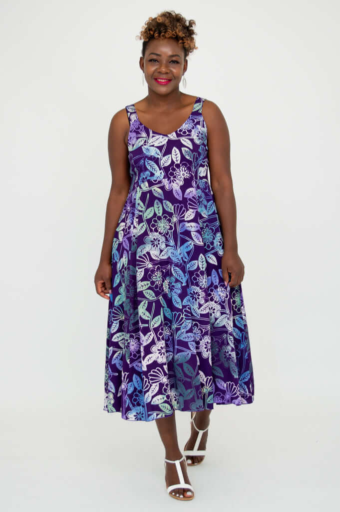 Model walking in Shauna violet floral print midi dress front view