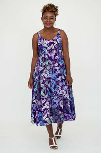 Model walking in Shauna violet floral print midi dress front view