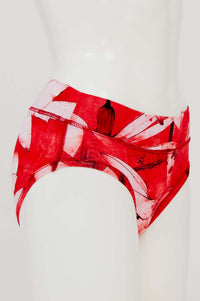 Side view of red hipster brief underwear with white abstract feather pattern