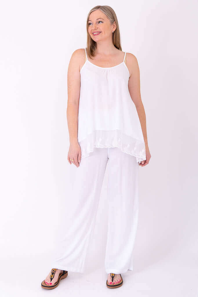 Angled view showing side details of white Chantilly Lace Tank outfit