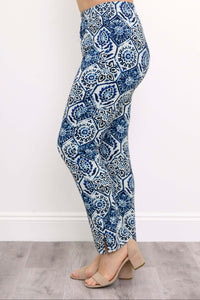 Side view of blue and white printed pants showing ankle slit detail