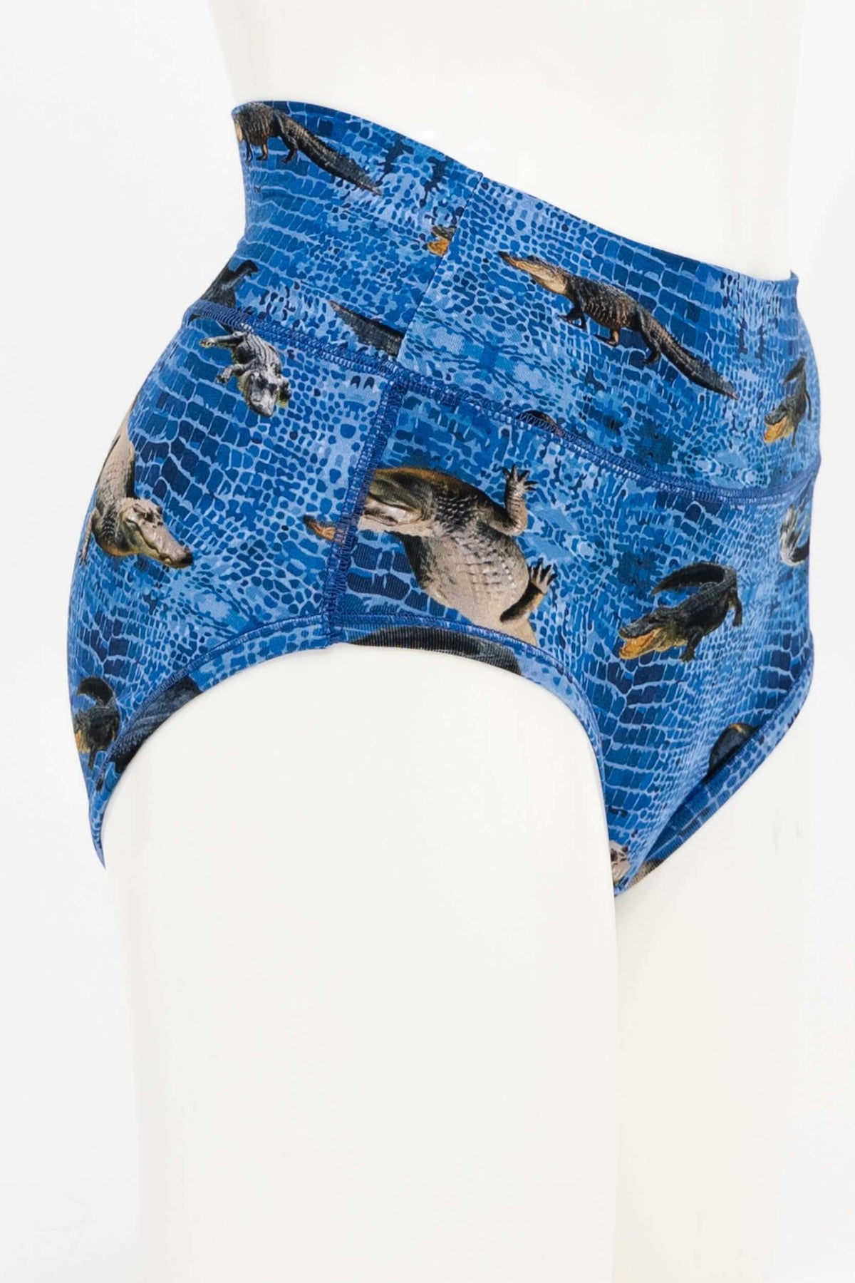 Side view of blue high-waisted crocodile print brief