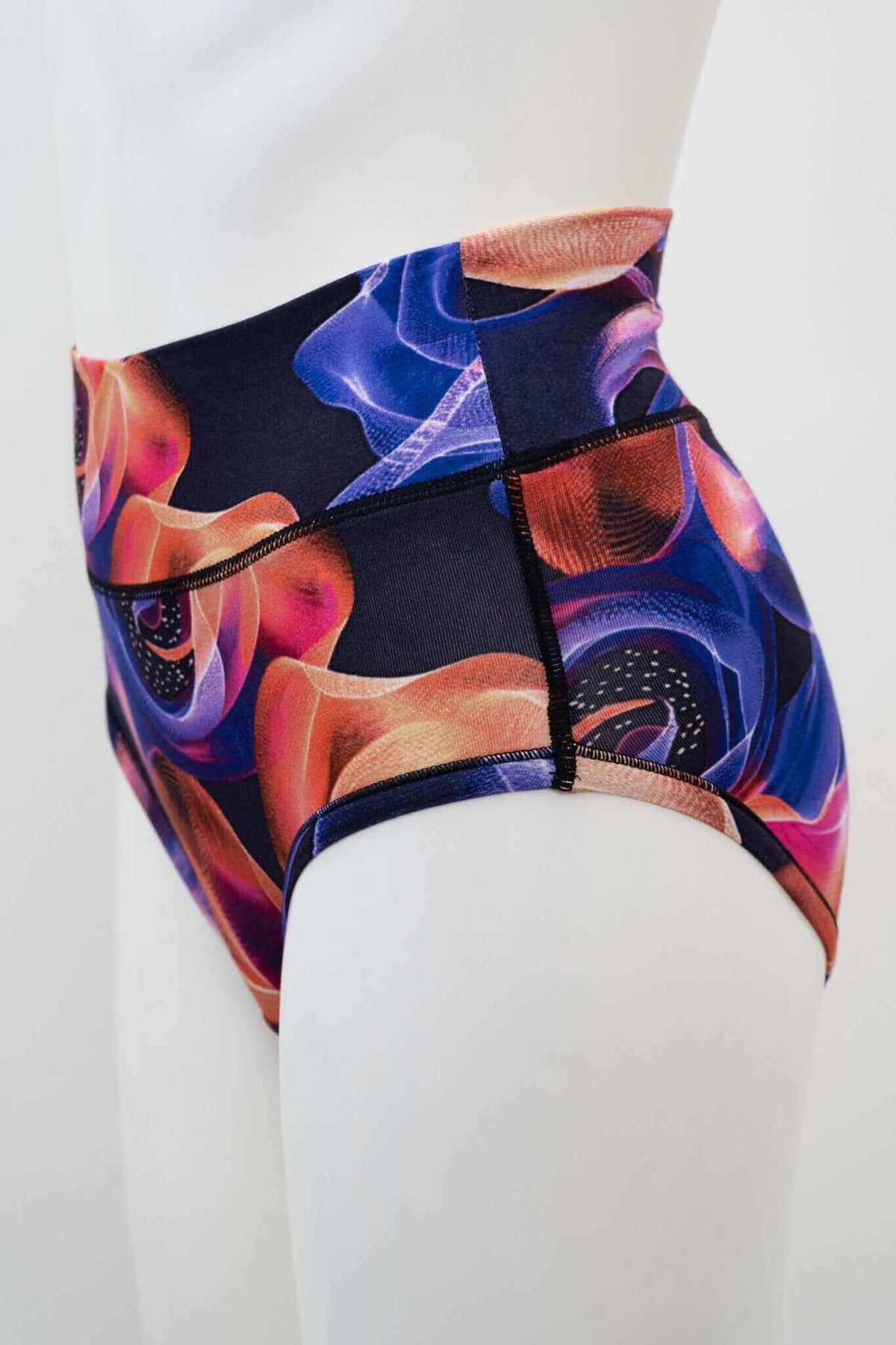 Side view of high-waisted brief with colorful swirl pattern