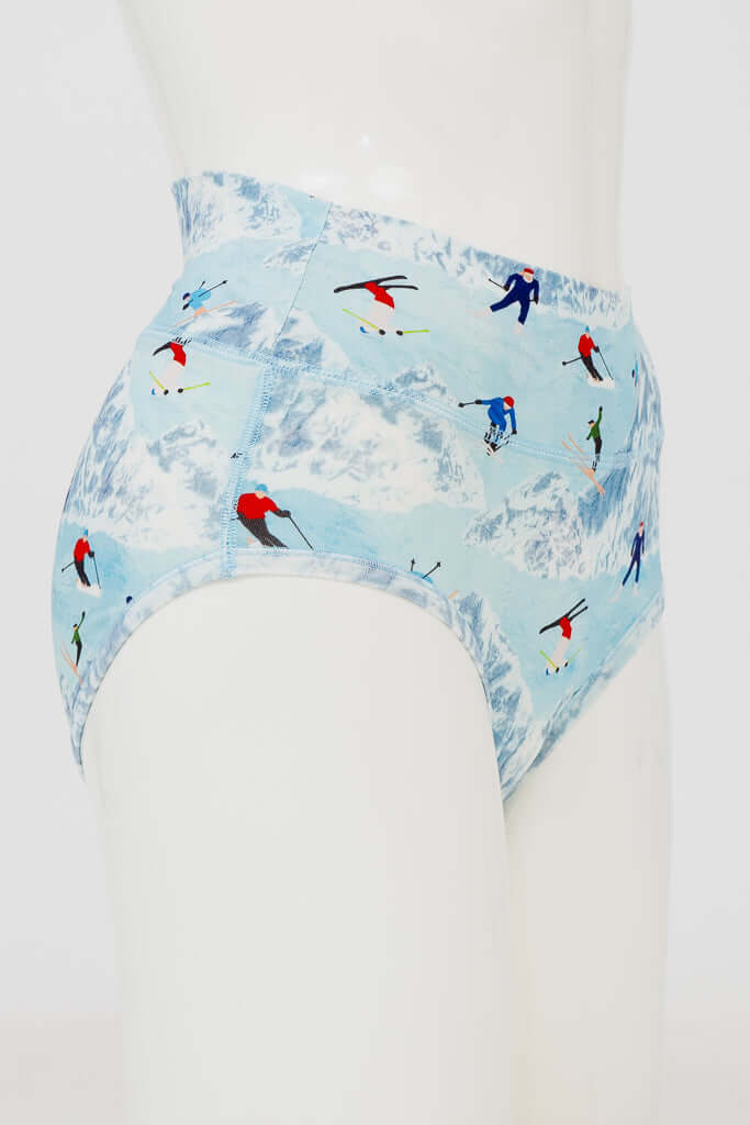 Side view of high-waisted bamboo briefs with ski print on a mannequin