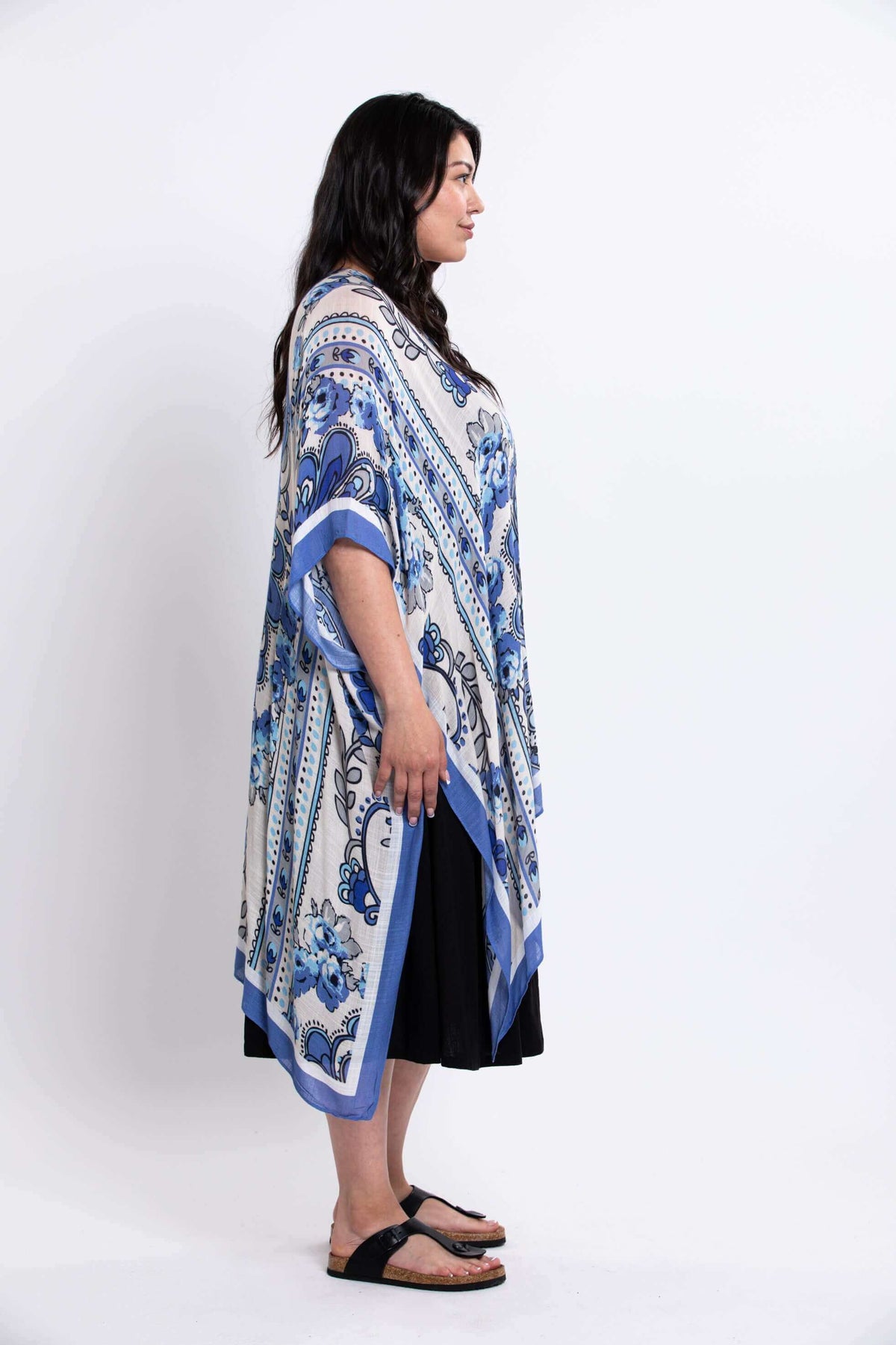 Side profile of the Darcy kimono wrap with a blue floral design