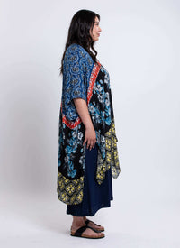Side view of Darcy kimono wrap on woman highlighting relaxed fit and mixed print details