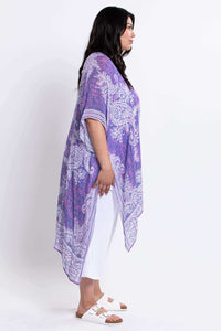 Side profile of model showcasing The Darcy Kimono Wrap's drape