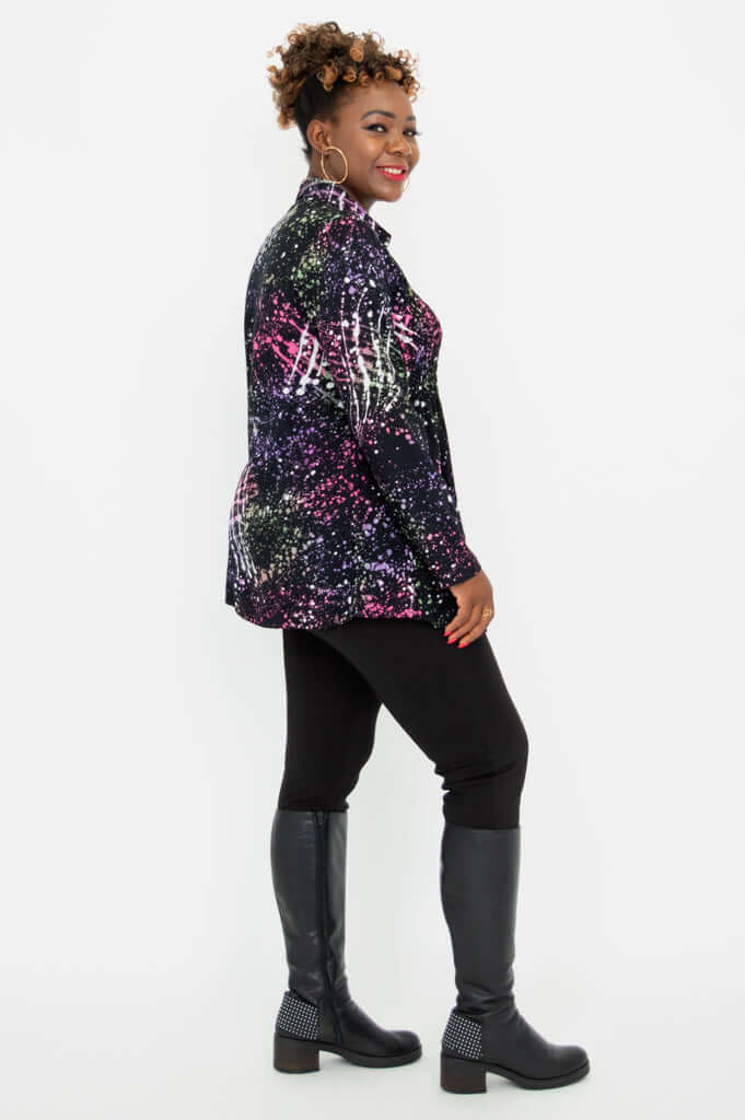 Side profile of the Cindy smocked long sleeve shirt showcasing the pleated front and vibrant print