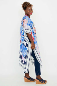Side view of model in Darcy kimono wrap showing fluid hemline and drape