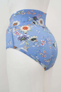 Side view of blue high-waisted brief with floral print on mannequin
