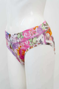 Side view of floral hipster brief showing low-rise waist and seamless finish