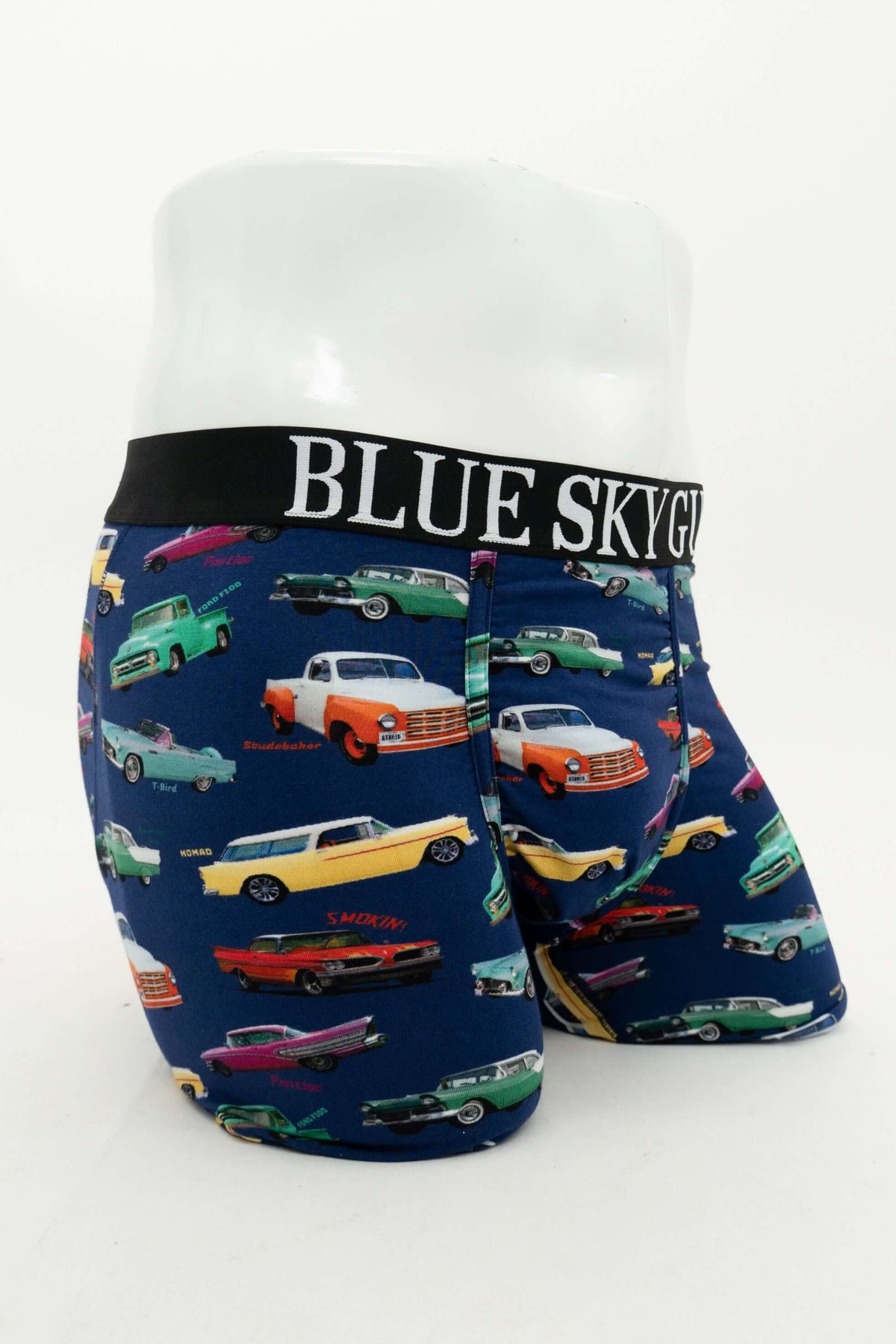Side view of men's bamboo boxer briefs featuring vintage car design and branded waistband
