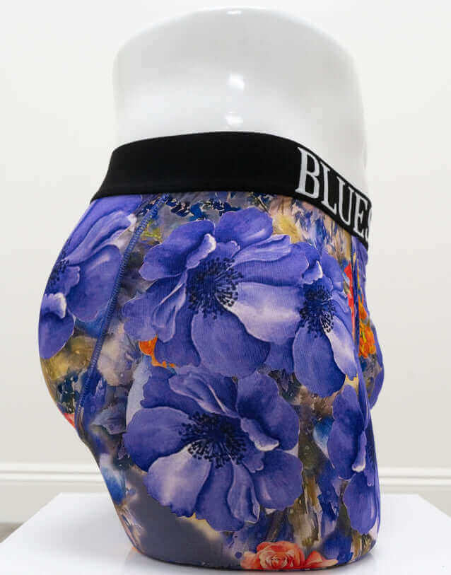 Side view of men's bamboo boxer briefs featuring vibrant blue and orange floral pattern