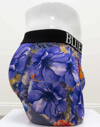 Side view of men's bamboo boxer briefs featuring vibrant blue and orange floral pattern