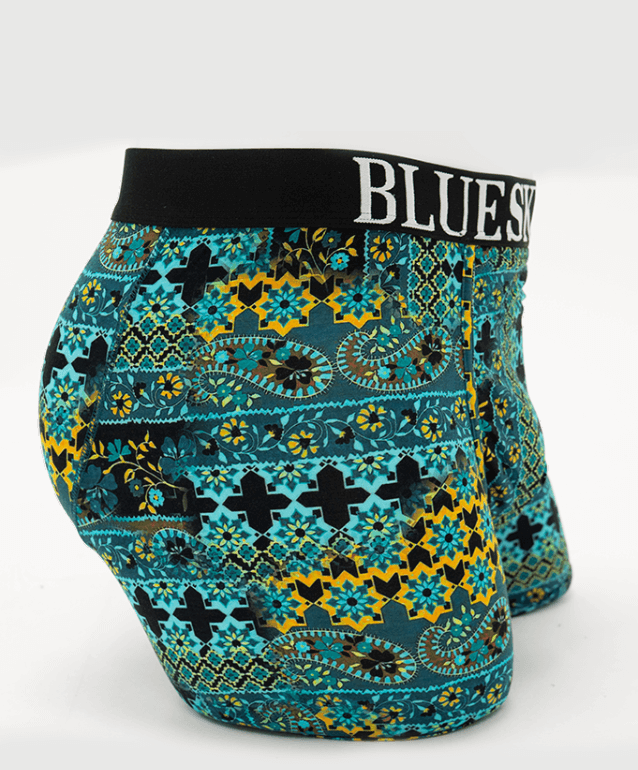 Side view of Middle Man underwear in blue and yellow geometric print with BLUESKY GUY waistband