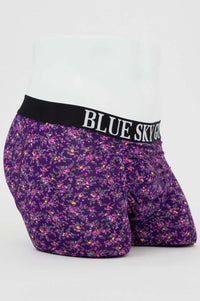 Side angle of purple floral bamboo boxer briefs showing supportive pouch and BLUE SKY GUY waistband