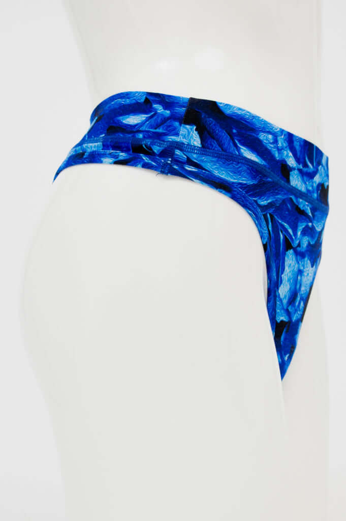 Side view of blue bamboo thong underwear highlighting high rise waist