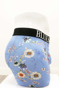 Side view of blue floral bamboo men's boxer briefs showing waistband and print