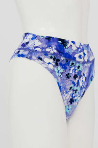 Side view of blue floral print high rise thong underwear on mannequin