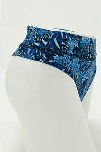 Side view of blue patterned high rise bamboo thong underwear on mannequin