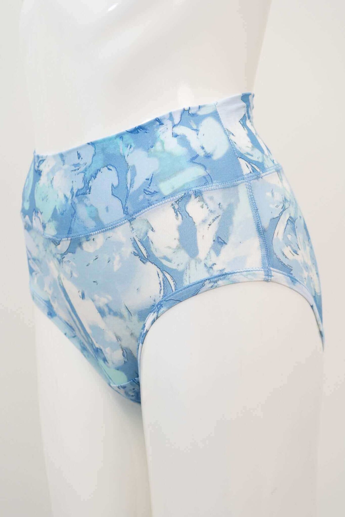 Side angle of blue watercolor print high waist brief showcasing waistband and fit