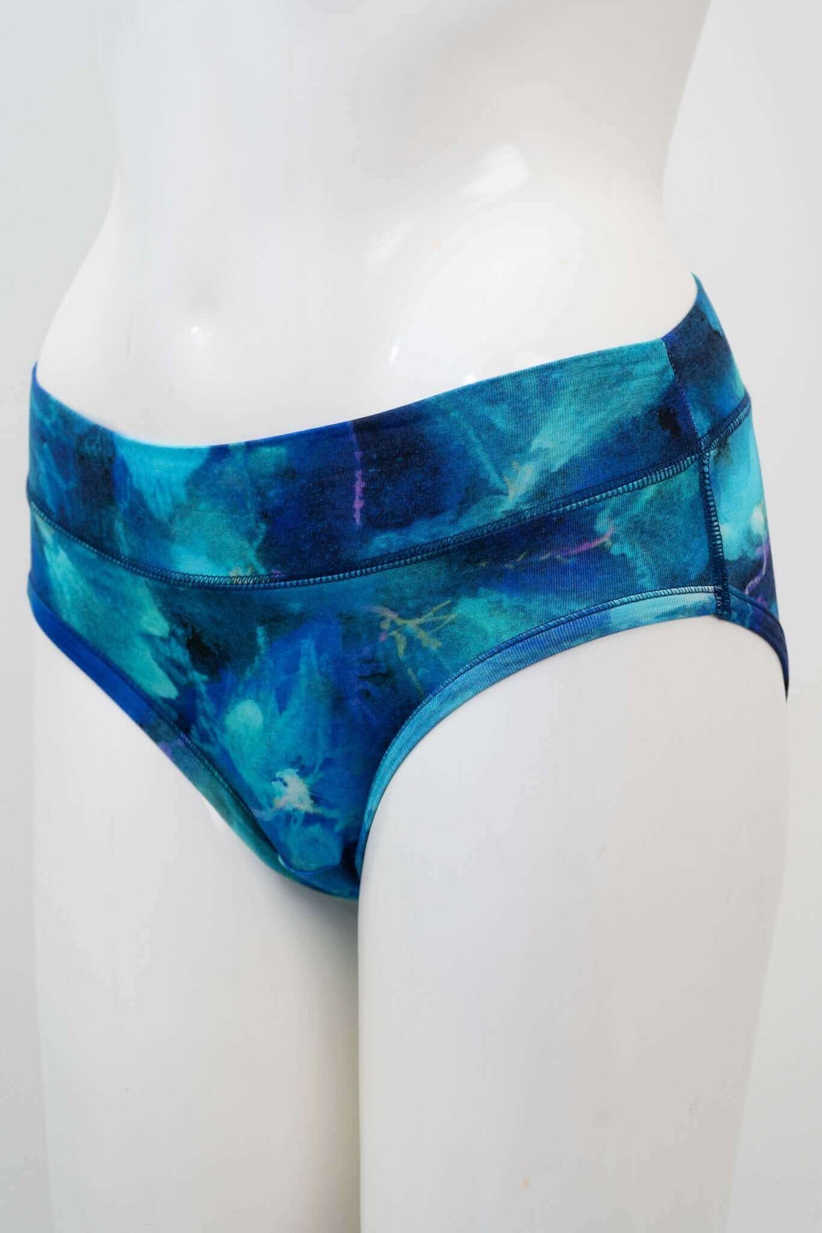 Side view of blue watercolour bamboo hipster underwear on mannequin