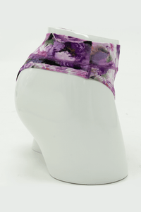 Side view of purple floral bamboo thong underwear on mannequin