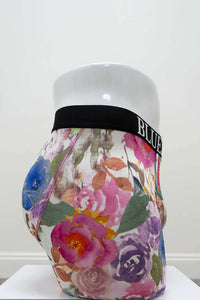 Side view of floral print men's bamboo boxer briefs on mannequin