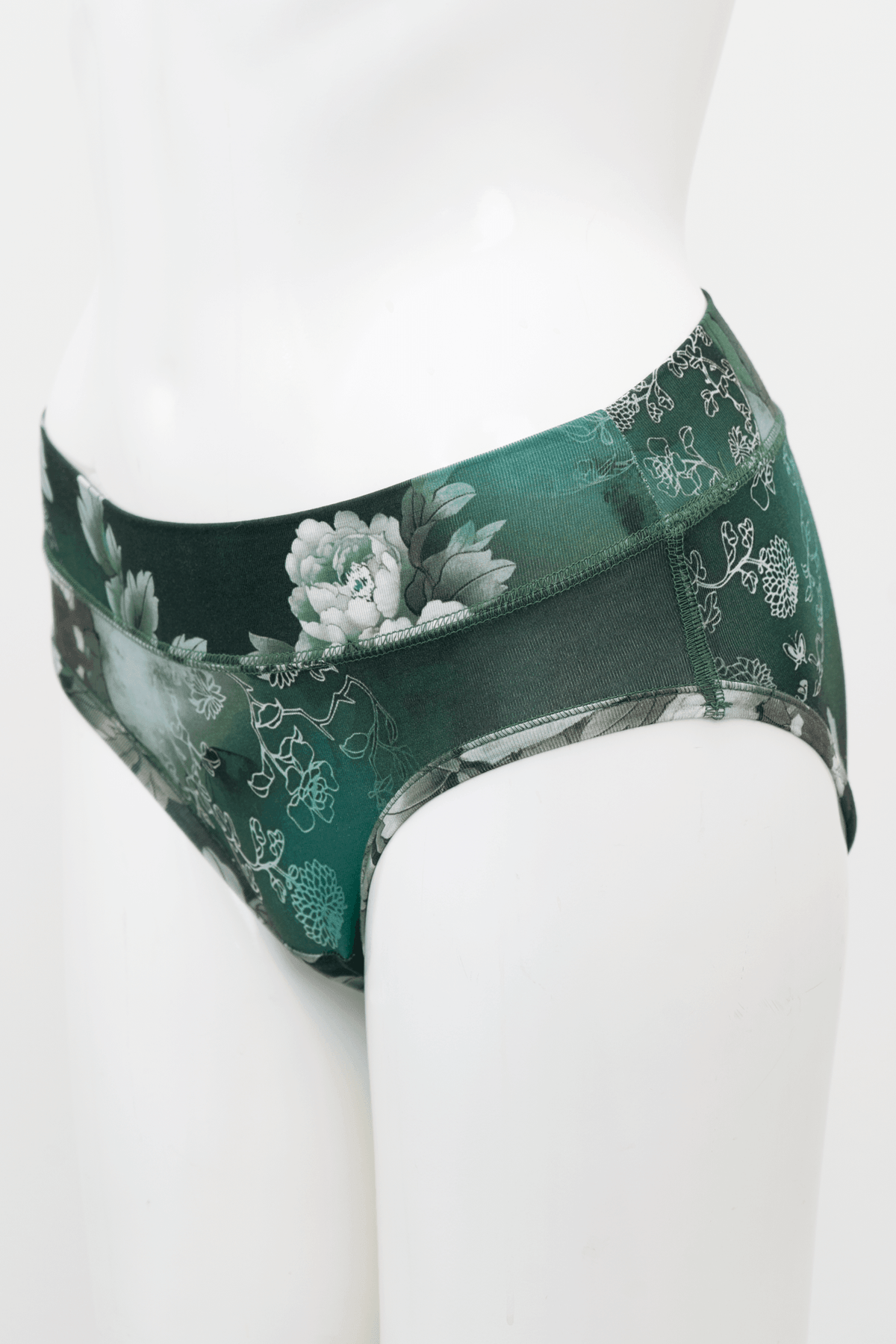 Side view of green bamboo hipster underwear with floral pattern on mannequin