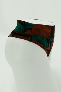 Side view of high-rise thong underwear with bamboo fabric in a multicolored design