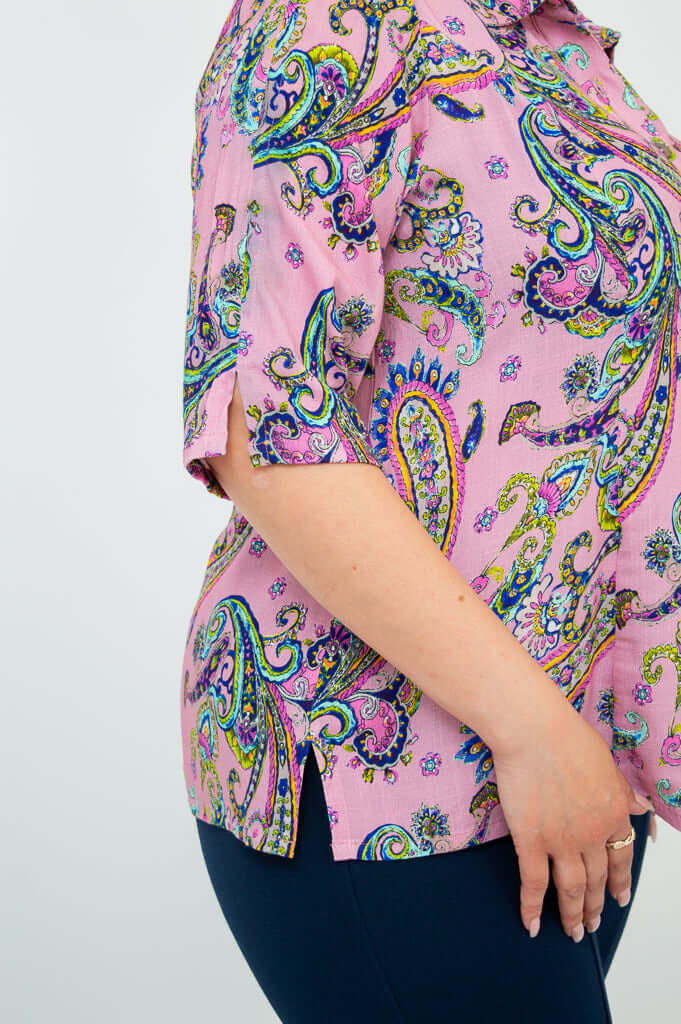 Close-up of sleeve showing slit detail and the paisley pattern on the pink bamboo-linen blouse
