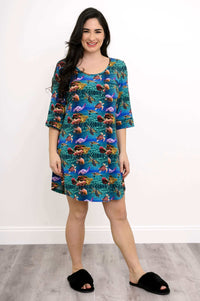 Woman smiling in a coral reef bamboo sleepshirt with 3/4 sleeves, front pose